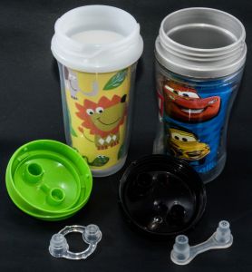 playtex playtime insulated spout cup - this photo shows the new valve version (left) next to the old...