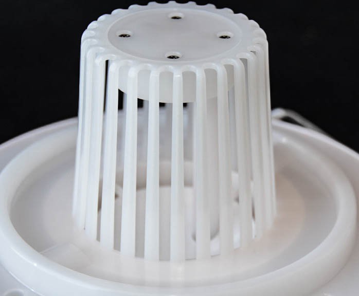 a close-up view of the cage surrounding the ultrasonic vibrator on...