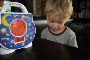 The red light on the Tot Clock indicates a time out or stay in bed...