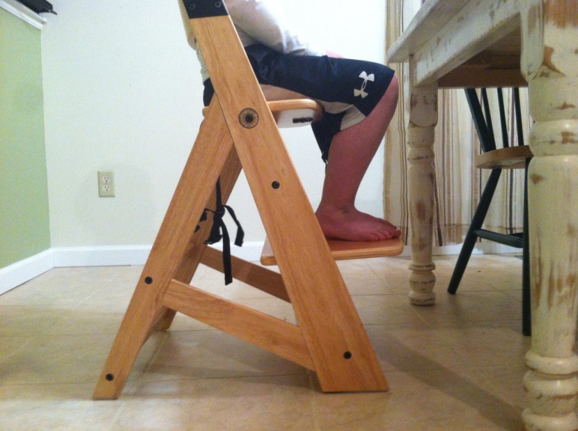 keekaroo height right with infant insert - this chair did not take up much floor space, and was easy to slide...