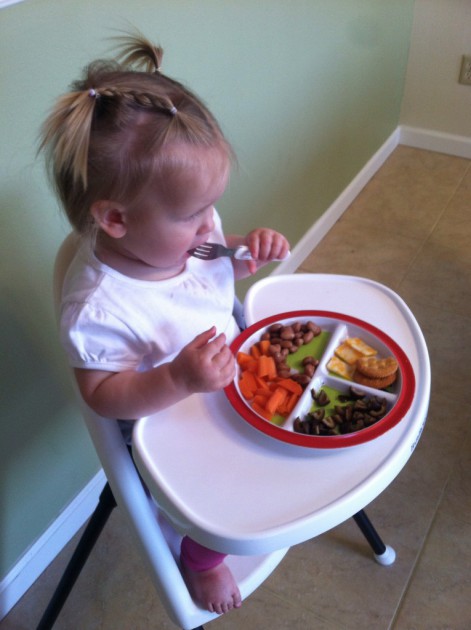 babybjorn - although the tray on this super-compact chair is on the smaller...