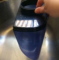 The Vornado Ultra3 water tank requires at least one hand to balance...