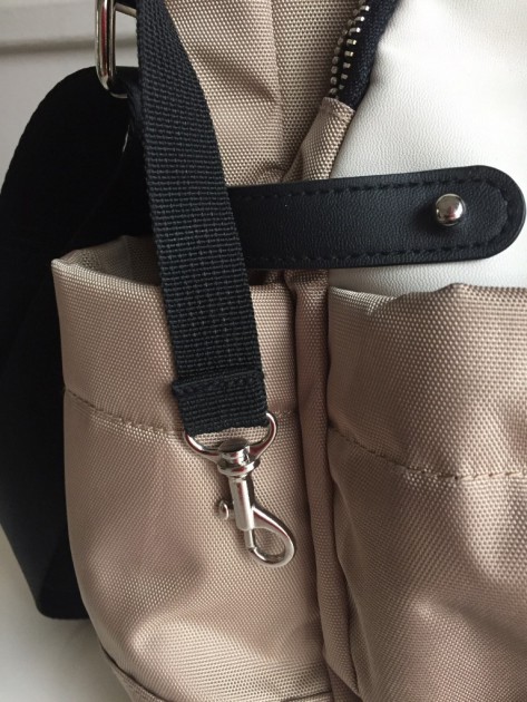 closeup of one of the easy-to-use stroller straps. keep in mind that...