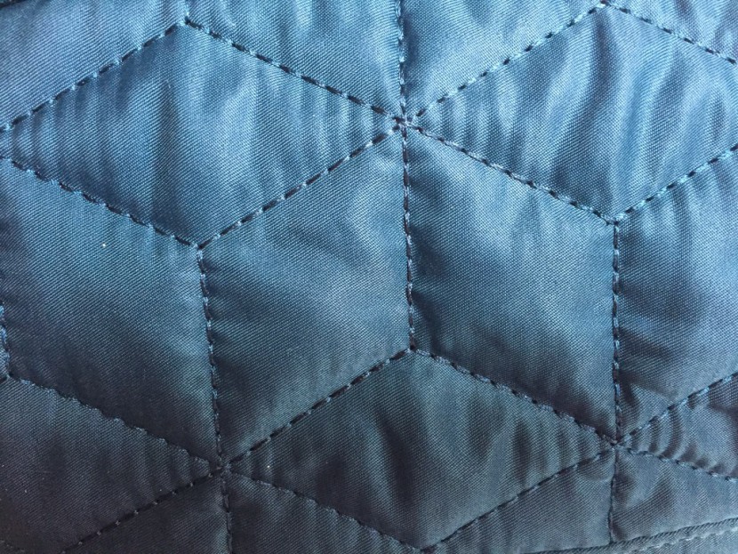 the jewel colored quilted fabric detail added a lot of style to this...