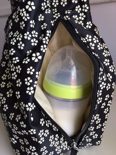 8oz comotomo bottle in the insulated pocket of the babymel amanda...