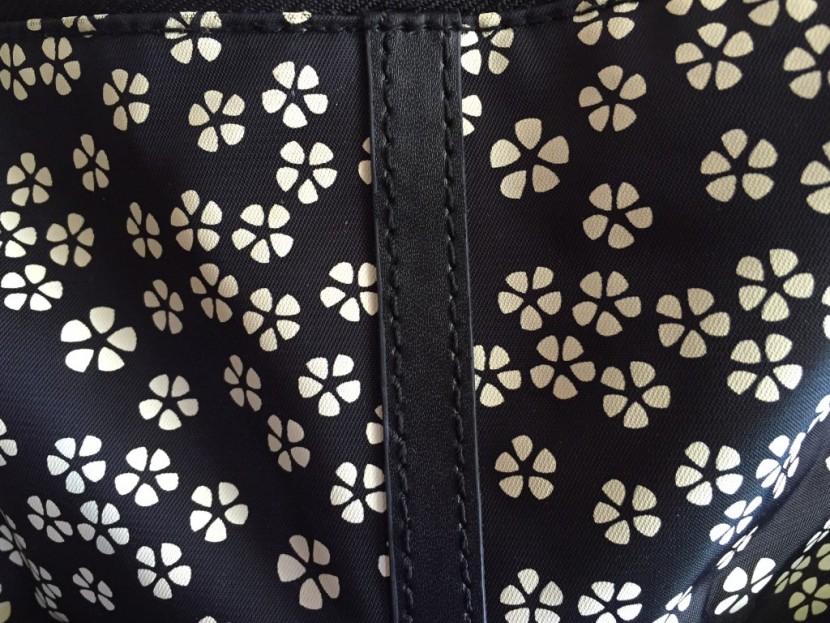 closeup of the fabric and stitching features on the babymel amanda...