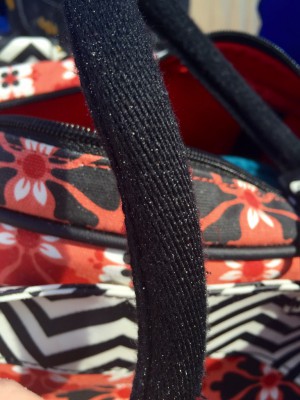 petunia pickle bottom sashay satchel - detailing on the comfortable cloth handle.