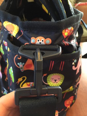 lesportsac ryan baby bag - a closeup of the plastic hardware featured on the lesportsac. as a...