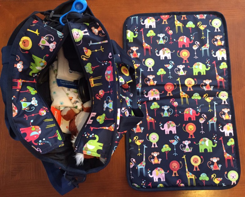 lesportsac ryan baby bag - the lesportsac ryan baby bag next to the included diaper changing pad.