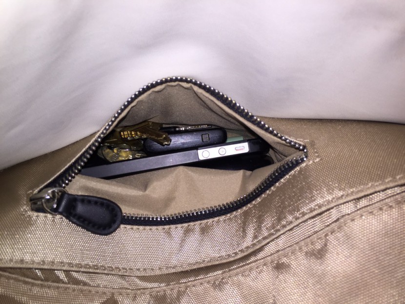 the small exterior pocket on the chelsea is just right for a phone...