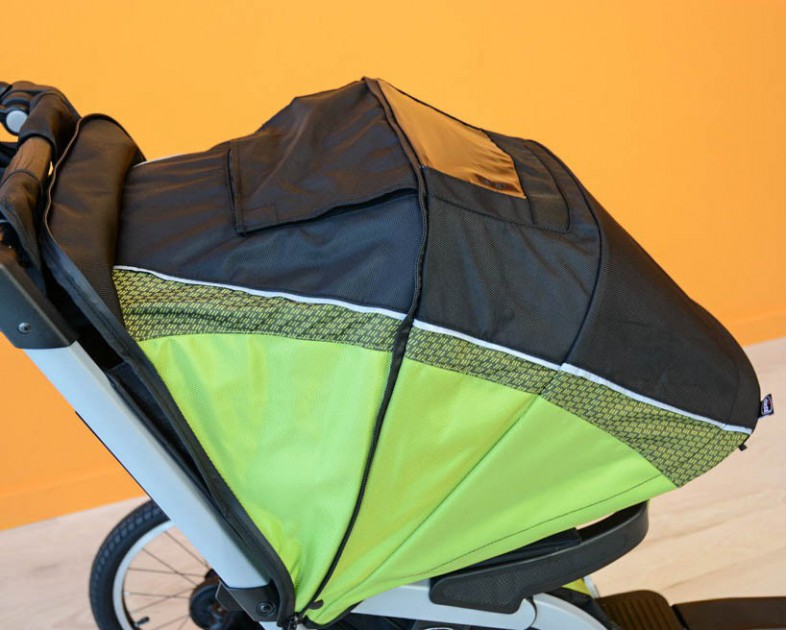 chicco tre - the peek-a-boo window on the tre is vinyl on one side and mesh when...