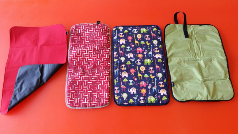the nicest changing pads in this diaper bag review are the petunia...