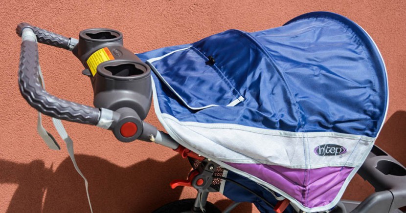 instep grand safari - the grand safari has a small canopy and even smaller peek-a-boo window