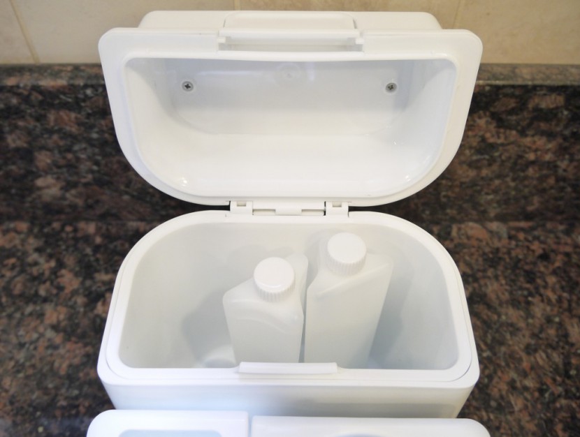 two ice packs and 2-3 bottles can fit in the born free tru-temp's...