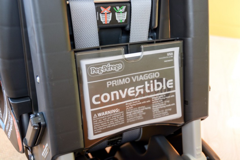 convertible car seat - the user manual for the peg perego fits in a designated storage...