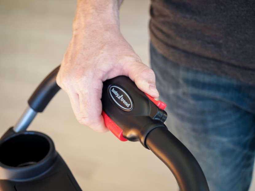 baby trend snap-n-go ex universal - to fold the trend you first need to slide the unlock button on the...