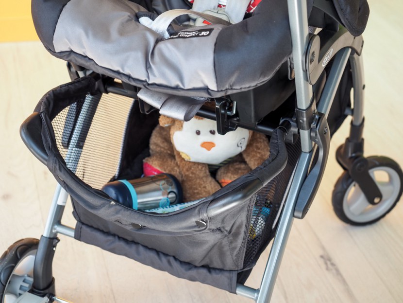 graco snugrider elite - the storage bin on the snugrider is fairly large, but has poor...