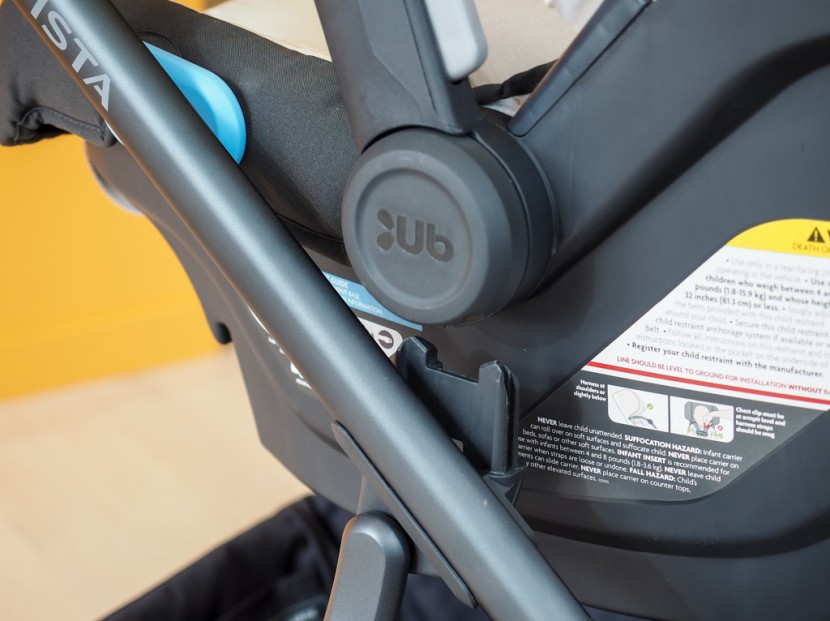 stroller and car seat combo - the mesa attaches to the vista by aligning the seat up to the...