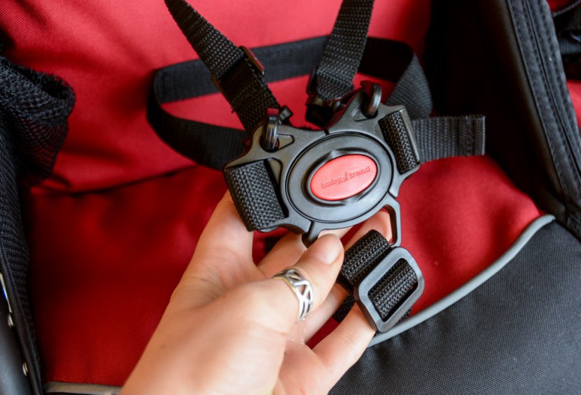 baby trend expedition double - the buckle on the expedition is stiff, but the straps pop out on...