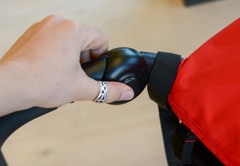 mountain buggy duet - the handlebar on the duet adjusts on a pivot point. it has one of...