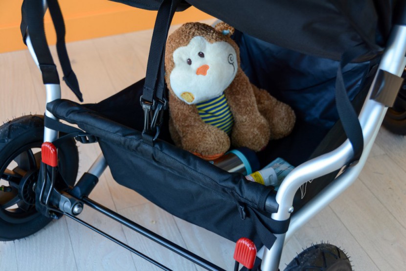 mountain buggy duet - while the storage bin on the duet is rather small, it can hold a lot...
