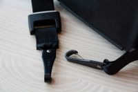 The Phil and Teds Alpha has the more traditional style anchor clip...