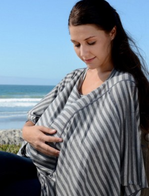 DRIA Nursing Cover with mom keeping an eye on baby while...