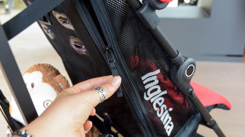 inglesina net - the inglesina reclines by unzipping a zipper on each side. however...