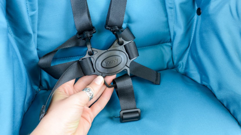 joovy caboose ultralight graphite with rear seat - the caboose harness are easy to use, though more difficult to loosen...