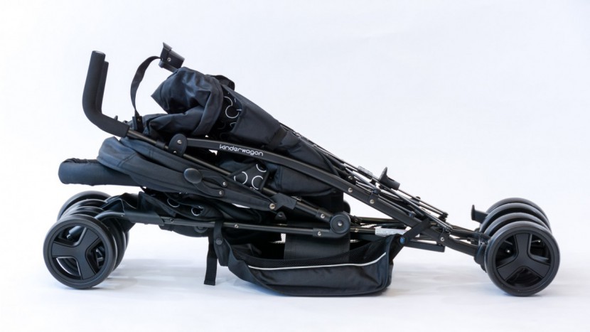 double travel stroller - the folded hop is on the larger side with almost all of the...