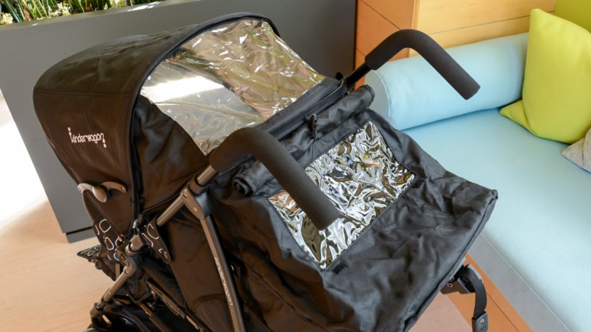 kinderwagon hop - the hop front canopy is larger than the rear, but the window has no...