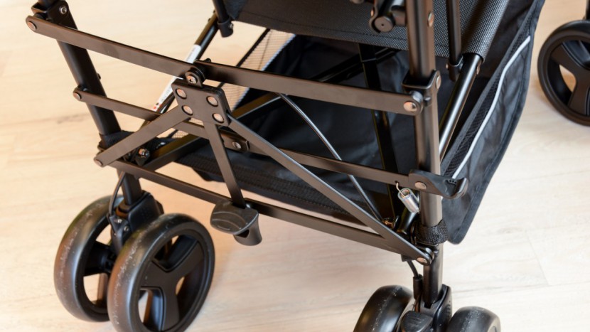 kinderwagon hop - the hop has a busy design with lots of exposed fasteners and pinch...