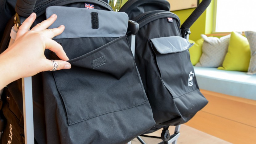 the twin has twin pockets on the back of the canopies that close...