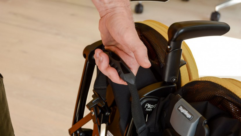 peg perego pliko mini twin - the twin mini has a carry handle, but given its heavier weight, a...