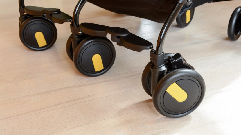 peg perego pliko mini twin - the 5 front wheels of the peg make it hard to turn, as the wheels...