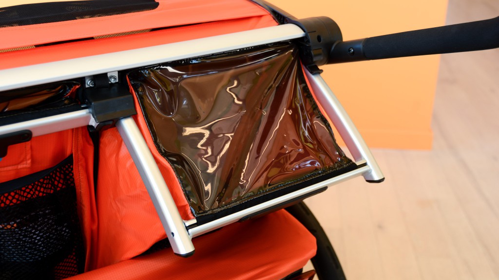 thule chariot cross 2 - the seats on the chariot cross 2 recline and have a vinyl peek-a-boo...