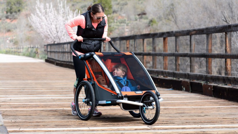 thule chariot cross 2 with jogging kit - the cross 2 seats two passengers in 5-point harness on seats that...