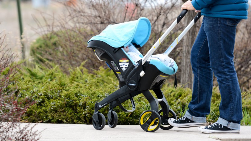stroller and car seat combo - the brakes on the doona are nicely placed and easy to use with color...