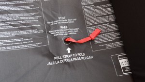 Folding the Graco is easy with the centrally located pull handle.