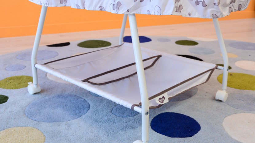 delta children deluxe sweet beginnings - the delta has a divided shallow storage tray under the sleeping...