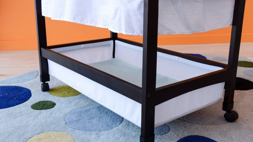 summer infant classic comfort wood - the summer infant has a storage bin under the sleeping area.