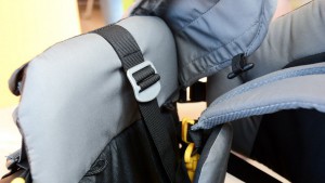 The seat pad on the Deuter uses a buckle adjustment located under...