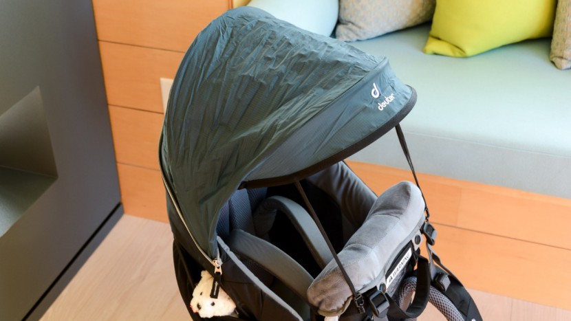 deuter kid comfort 3 - the deuter canopy deploys from a top pocket and connects via clip in...