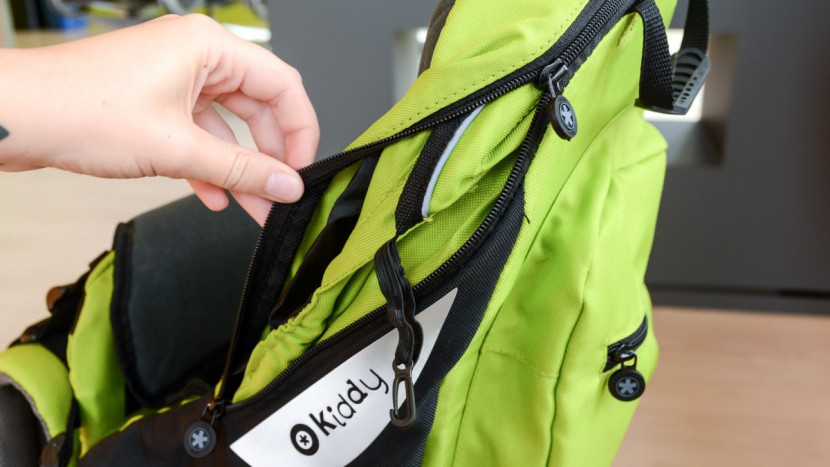 kiddy adventure pack - the canopy of the kiddy stores in the top pocket of the pack. it...