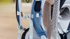 The front chest clip of the Osprey helps draw the shoulder straps in...