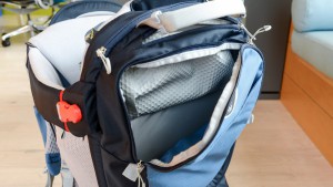 The top pocket on the Osprey has a wide zipper and internal pockets...