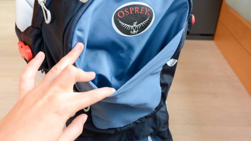 the back of the osprey has a flat open pocket good for storing maps...
