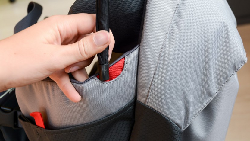 the rear "legs" of the escape's canopy slide into the red slit in...
