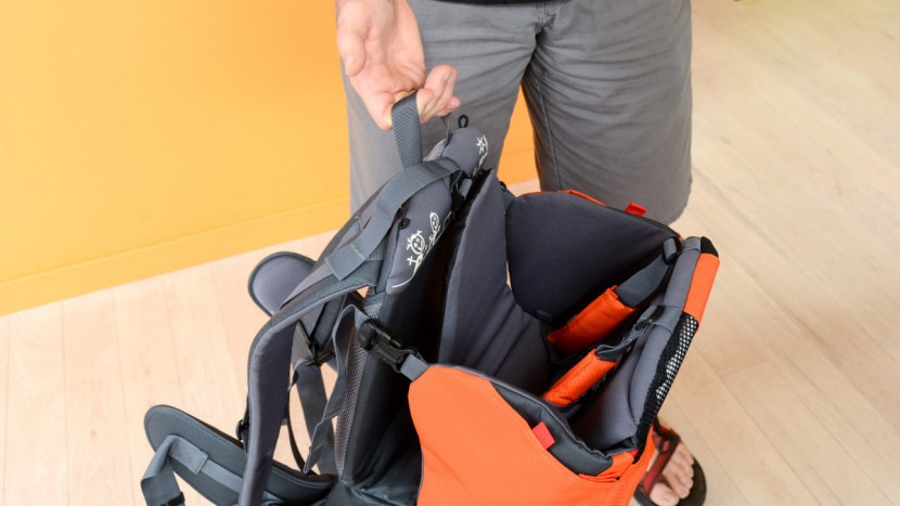 phil and teds parade - the parade has a carry handle on the back of the pack.