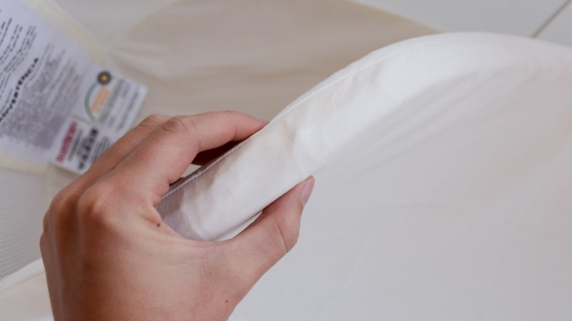 babybjorn cradle - the cradle may be thick but it easily compresses under pressure...